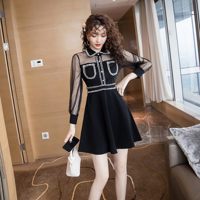 Rochie elegantă de damă cu mâneci din tul și nasturi de culoare neagră