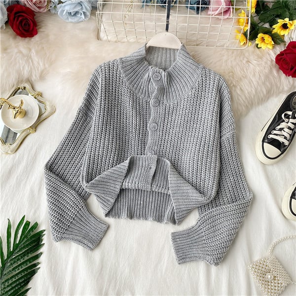 Модерна дамска жилетка с копчета и висока яка в четири цвята