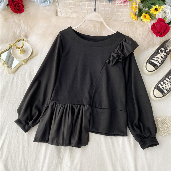 Bluză de damă modernă model asimetric cu decolteu oval și bucle