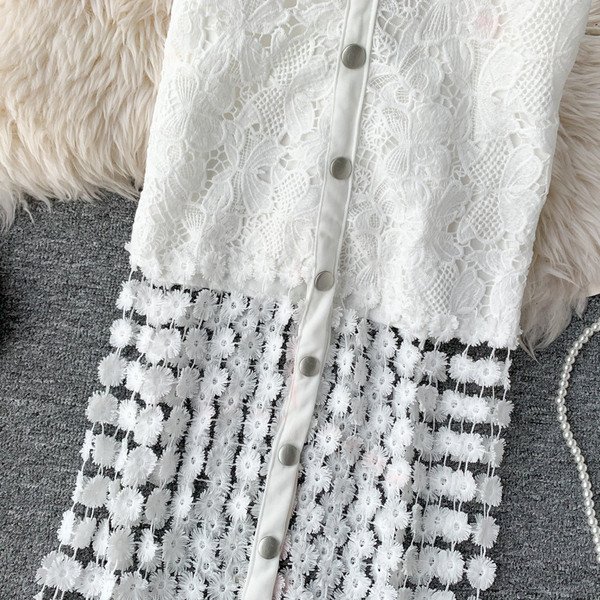 Fusta de dama moderna cu talie inalta si nasturi in alb si negru