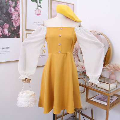 Új modell modern női ruha csupasz váll és gombokkal