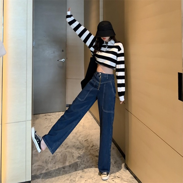 Hosszú és széles farmernadrág kék színben, cipzárral és zsebekkel