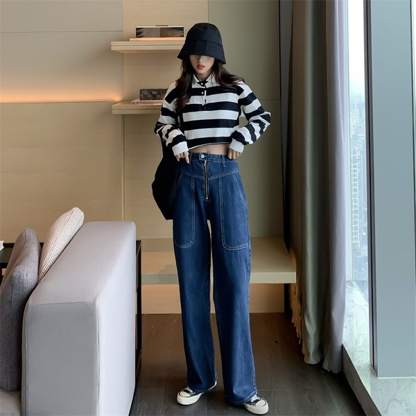 Hosszú és széles farmernadrág kék színben, cipzárral és zsebekkel