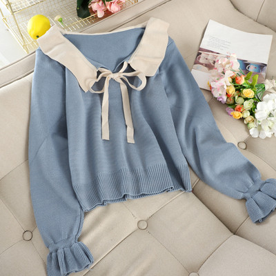 Női pulóver szalaggal és gallérral több színben