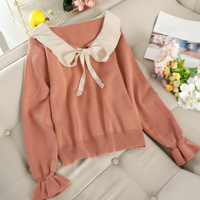 Női pulóver szalaggal és gallérral több színben