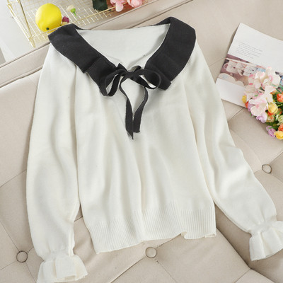 Női pulóver szalaggal és gallérral több színben