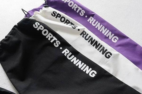 Pantaloni sport de dama cu cravate in alb, negru si mov