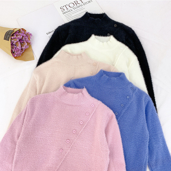 Női pehelypulóver gombokkal és alacsony gallérral több színben