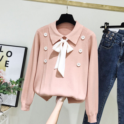 Aktuális női pulóver gombokkal és nyakkendőkkel fehér és rózsaszín színben