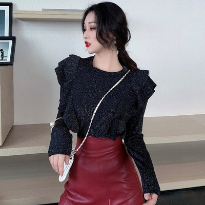 Γυναικεία μπλούζα με κουμπιά σε μαύρο χρώμα με γυαλιστερό αποτέλεσμα