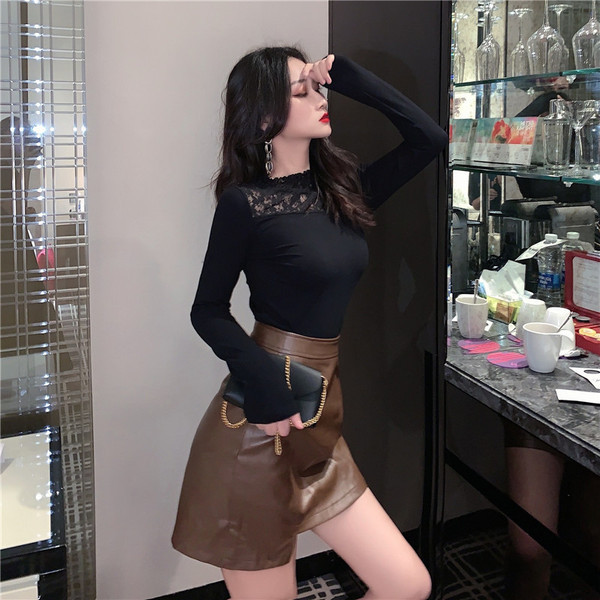 Bluză de damă în formă de alb și negru cu dantelă