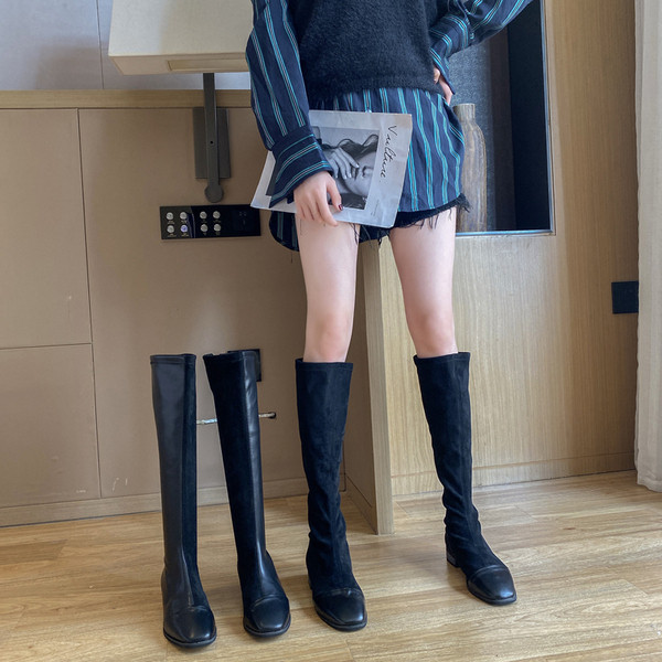 Női modern téli csizma alacsony sarkú fekete színben