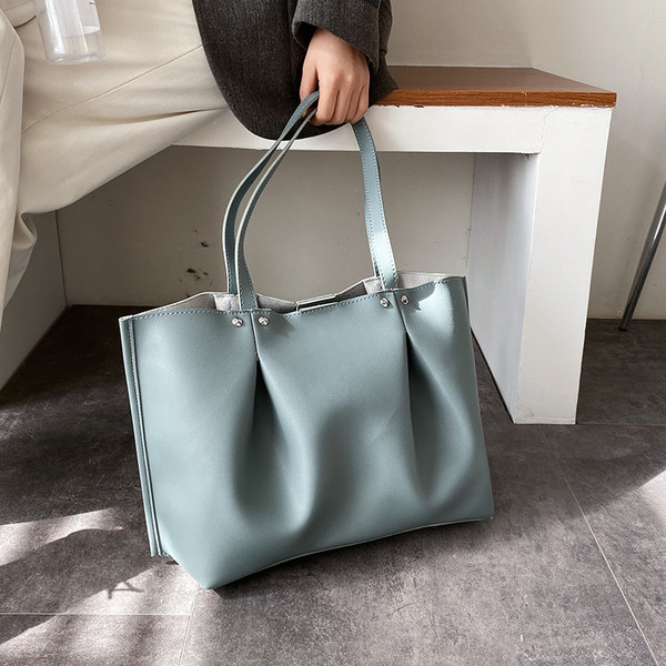 Καθημερινή γυναικεία τσάντα με κοντή λαβή