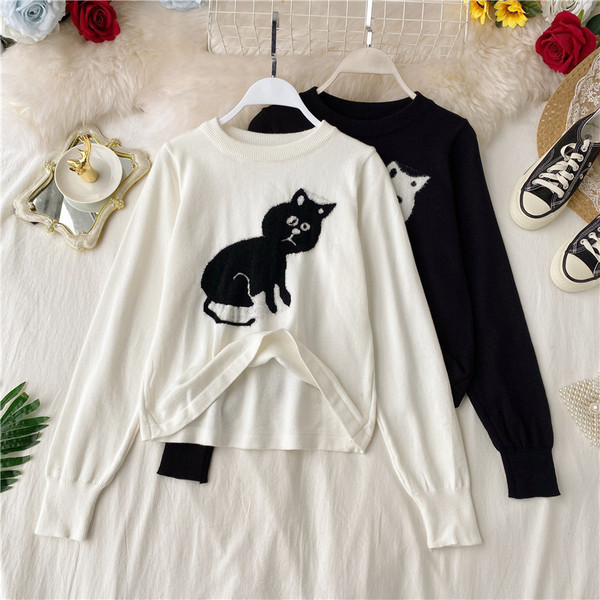 Μοντέρνο γυναικείο πουλόβερ σε λευκό και μαύρο χρώμα