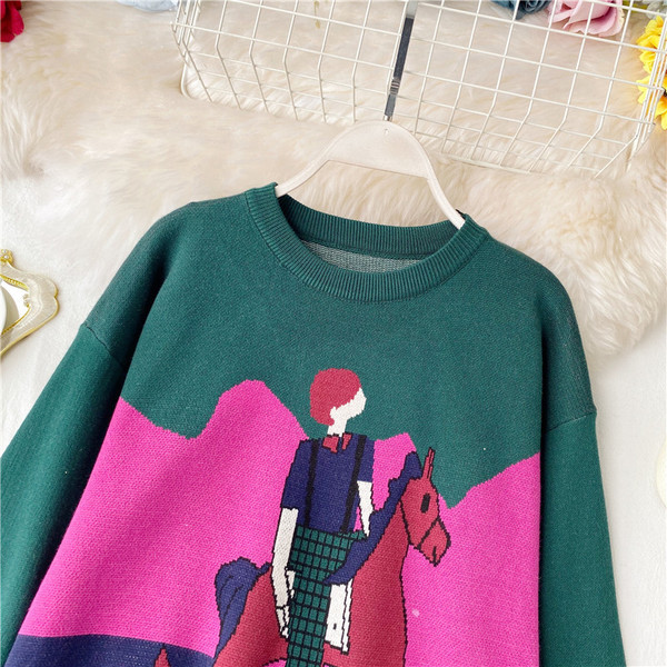 Alkalmi női pulóver rátéttel és ovális nyakkivágással