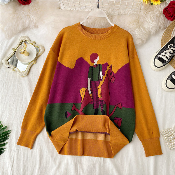 Alkalmi női pulóver rátéttel és ovális nyakkivágással