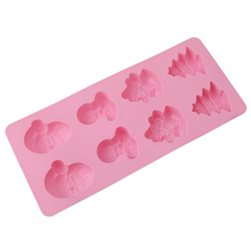 Formă din silicon pentru coacerea a opt fursecuri de Crăciun în culoarea roz