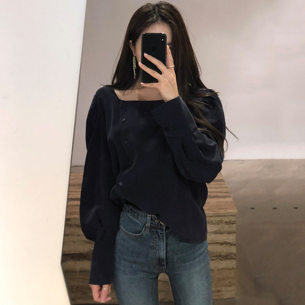 Bluza de dama cu nasturi in alb si negru