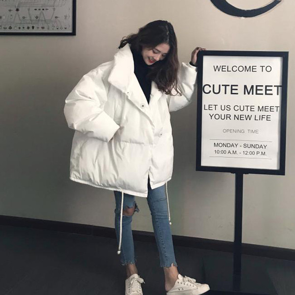 Női aktuális kabát két színben széles modellben