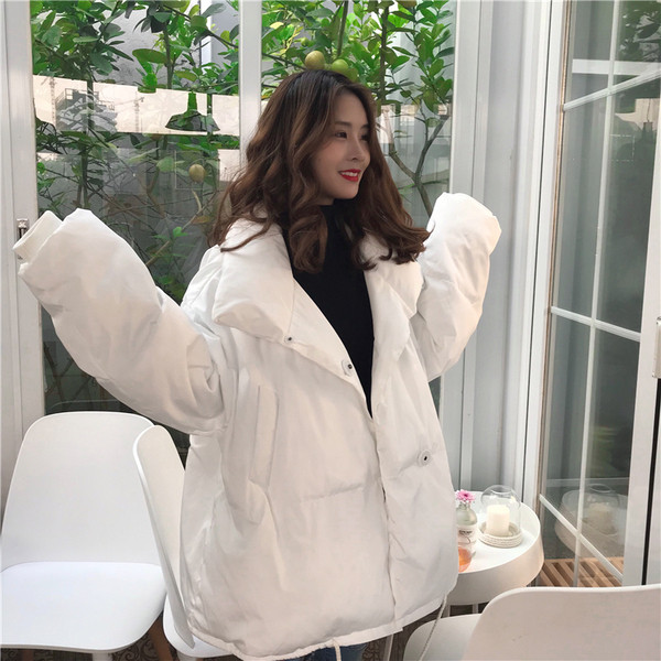 Női aktuális kabát két színben széles modellben