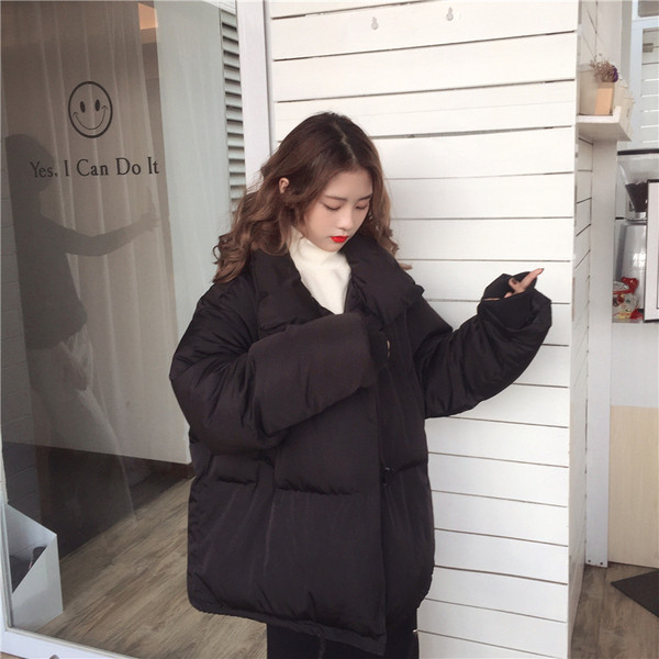 Női aktuális kabát két színben széles modellben