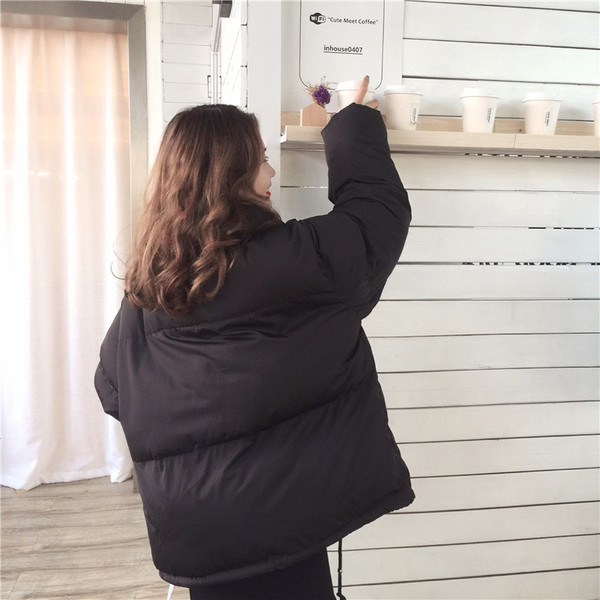 Női aktuális kabát két színben széles modellben