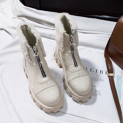 Modern női bőrcsizma magas talppal