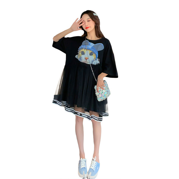 Rochie moderna de dama in alb si negru cu aplicatie colorata potrivita pentru gravide