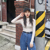 Női testhezálló blúz polo gallérral, több színben