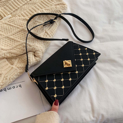 Geanta de dama moderna cu inchidere metalica in patru culori