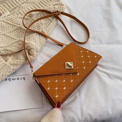 Geanta de dama moderna cu inchidere metalica in patru culori