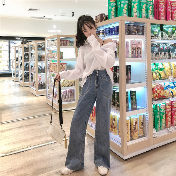 Blugi largi de dama cu buzunare in albastru