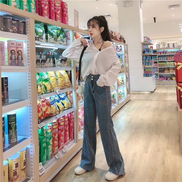 Blugi largi de dama cu buzunare in albastru