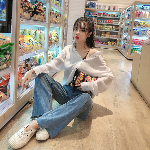 Blugi largi de dama cu buzunare in albastru