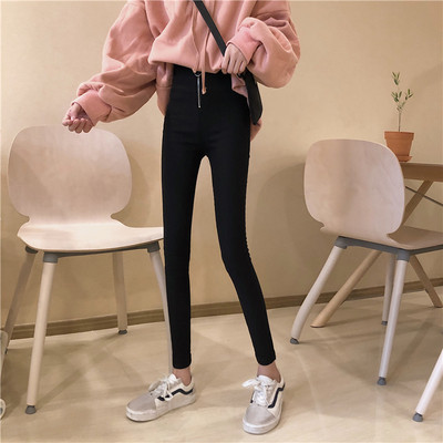 Fekete színű, vastag női cipzáros nadrág