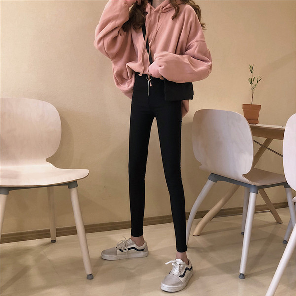 Fekete színű, vastag női cipzáros nadrág