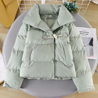 Modern női kabát gombokkal és zsebbel négy színben