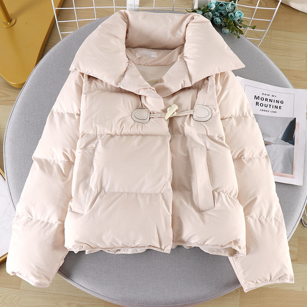 Modern női kabát gombokkal és zsebbel négy színben