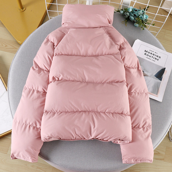 Modern női kabát gombokkal és zsebbel négy színben