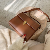 Geanta de dama eleganta cu inchidere metalica in patru culori