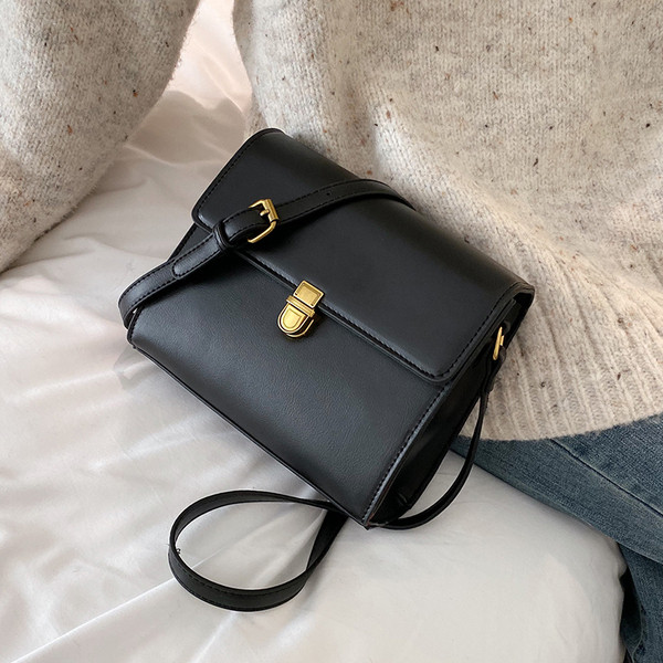 Geanta de dama eleganta cu inchidere metalica in patru culori