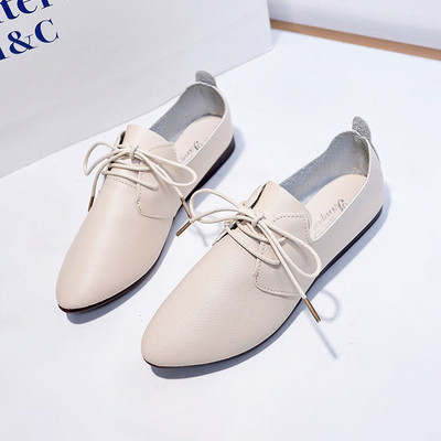 Lapos talpú női alkalmi cipő fekete-fehér színben