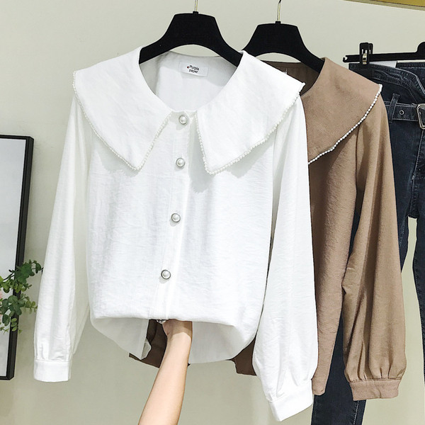 Camasa de dama model nou cu decolteu rotund si nasturi in alb si maro