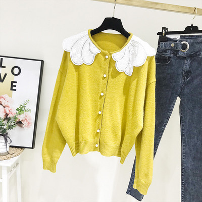 Alkalmi női kardigán sárga és bézs gombokkal