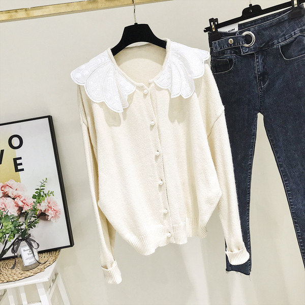 Alkalmi női kardigán sárga és bézs gombokkal