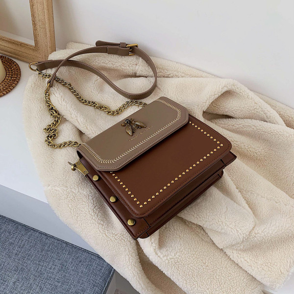 Fém elemes modern női táska több színben