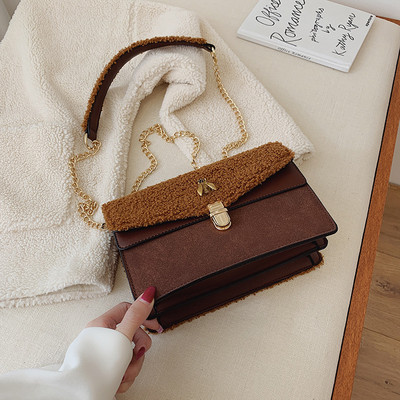 Geanta de dama moderna cu puf si element metalic in mai multe culori