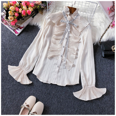 Új modell női ing pólógallérral és flitterekkel fehér és bézs színben