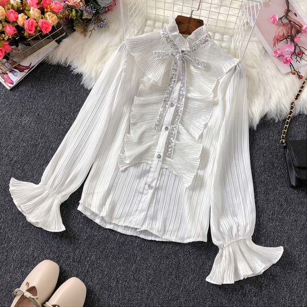 Új modell női ing pólógallérral és flitterekkel fehér és bézs színben