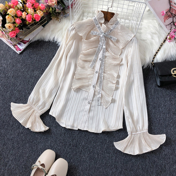 Új modell női ing pólógallérral és flitterekkel fehér és bézs színben